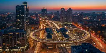 Modern urban transit network with buses, trains, and light rail at dusk, symbolizing future transportation improvements.