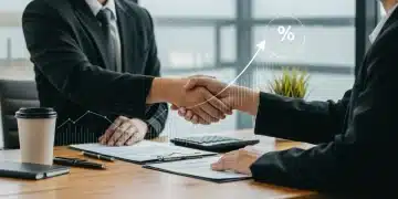 Professional shaking hands after successful US job offer negotiation
